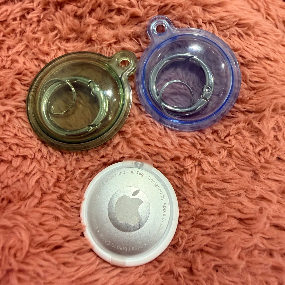 New Apple AirTag with Green and Blue Holders